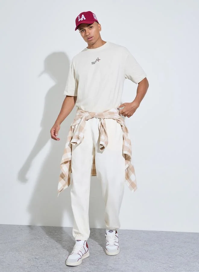 Styli Cream Embroidery and Print Crew Neck Oversized T-Shirt