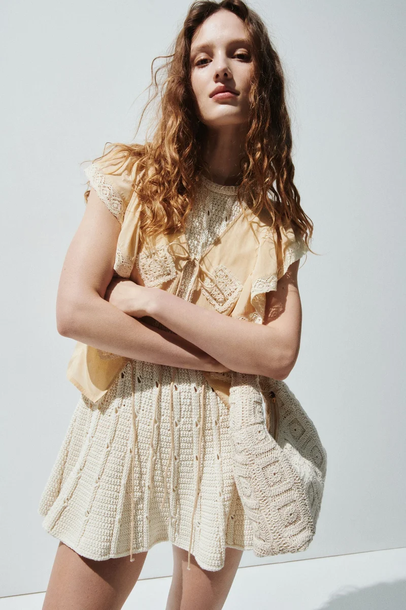 H&M Lace-trimmed flounced blouse