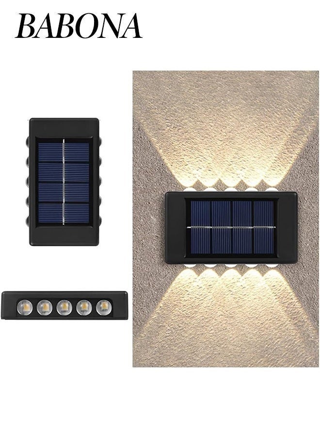 بابونا قطعتان من مصابيح سياج الطاقة الشمسية، مصابيح حائط LED خارجية تعمل بالطاقة الشمسية، مصابيح استشعار ليلية آمنة مقاومة للماء IP65 للممر والشرفة والفناء والجراج والحديقة والسياج والرصيف والممر ومصابيح الحائط الشمسية - مصابيح تخييم خارجية مع 10 مصابيح LED، إضاءة دافئة للفناء والشارع والمناظر الطبيعية وديكور الحديقة - Image 1