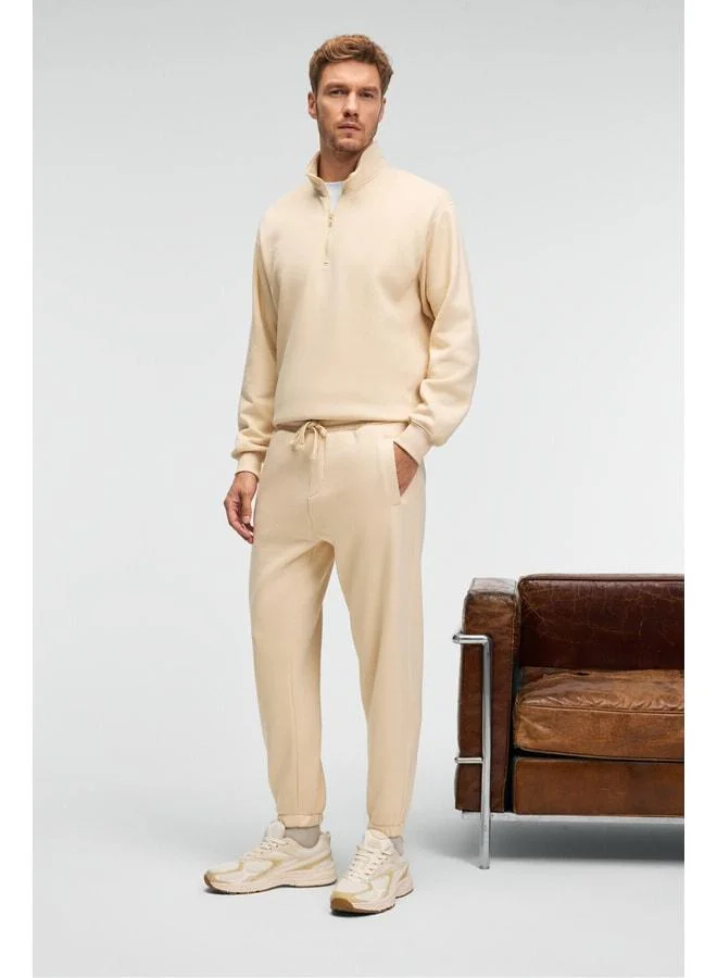 GRIMELANGE ANSEL Men's Elastic Narrow Leg Three-Pocket Super Soft Organic Cotton Vanilla Sweatpants.