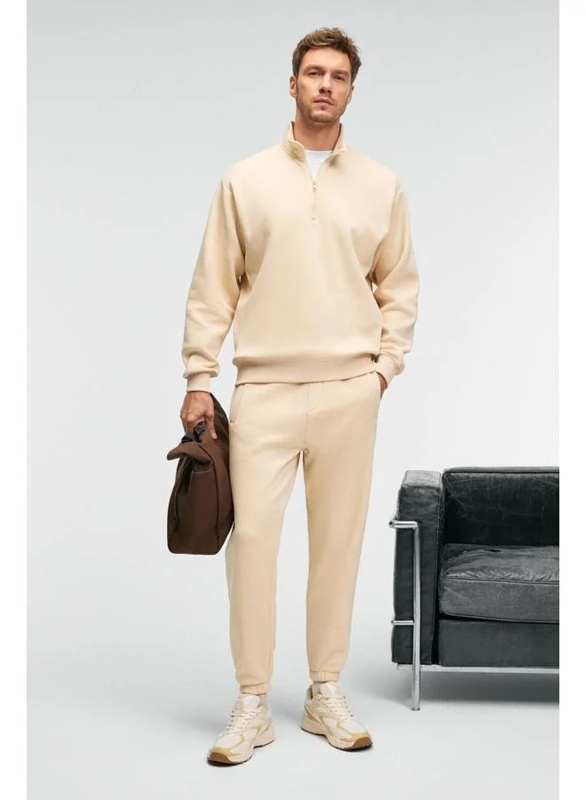 GRIMELANGE ANSEL Men's Elastic Narrow Leg Three-Pocket Super Soft Organic Cotton Vanilla Sweatpants.