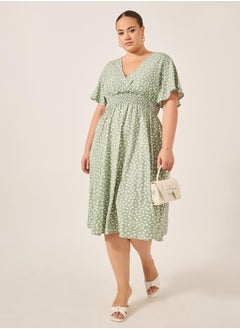 Styli Plus Size All-Over Printed V Neck A-Line Midi Dress  - Image 1