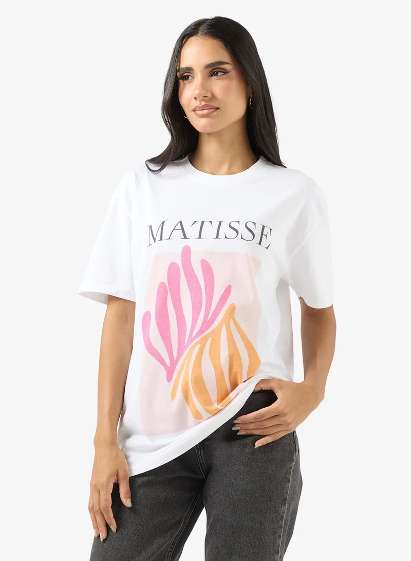 جينجر تيشيرت برسومات مجردة بياقة دائرية