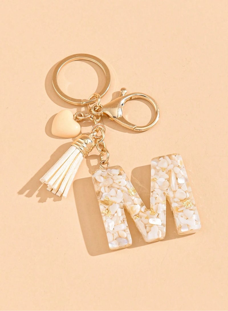 Beige Color Car Key Chain in The Shape Of The Letter M