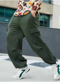 Campus Sutra Men's Forest Green Solid Cargo Parachute Trousers  - Image 1