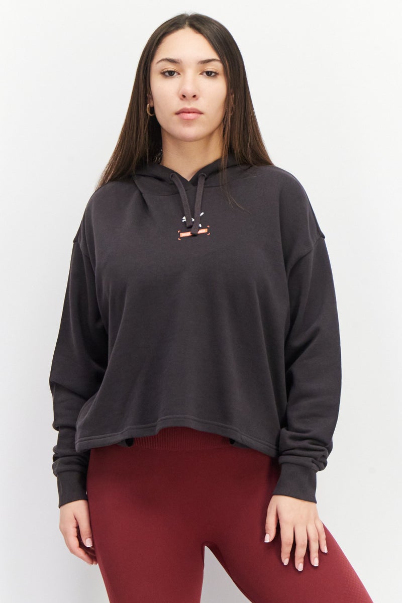 PUMA Women Sportswear Fit Brand Logo Training Hoody, Black - Image 1