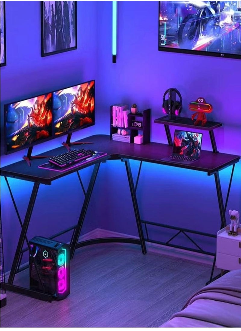‘Gaming Professional L-Shaped Gaming Desk - Sleek design with built-in shelves, suitable for multiple monitors and gaming consoles.