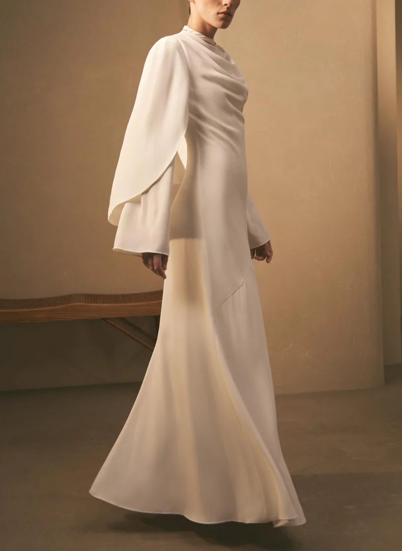 Maxi dress with high collar and draped bodice