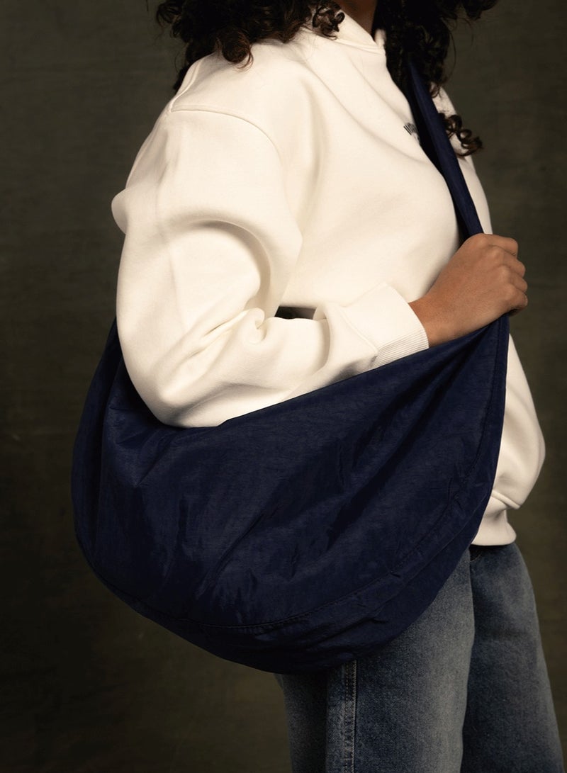 In Your Shoe Navy Blue Slouchy Sling Bag - Image 1