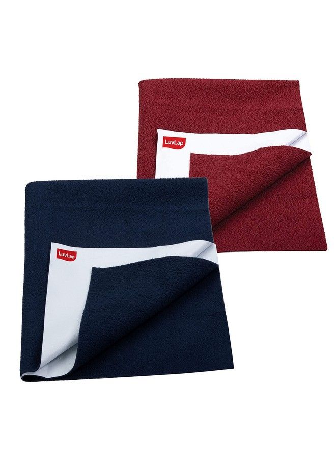 Luvlap ملاءة لوف لاب إنستادري سريعة الجفاف فائقة الامتصاص لحماية سرير الأطفال ومقاومة للماء باللون الكستنائي والأزرق الداكن للأطفال من عمر 0 أشهر فما فوق، مقاس متوسط 70 × 100 سم، عبوة من قطعتين - Image 1