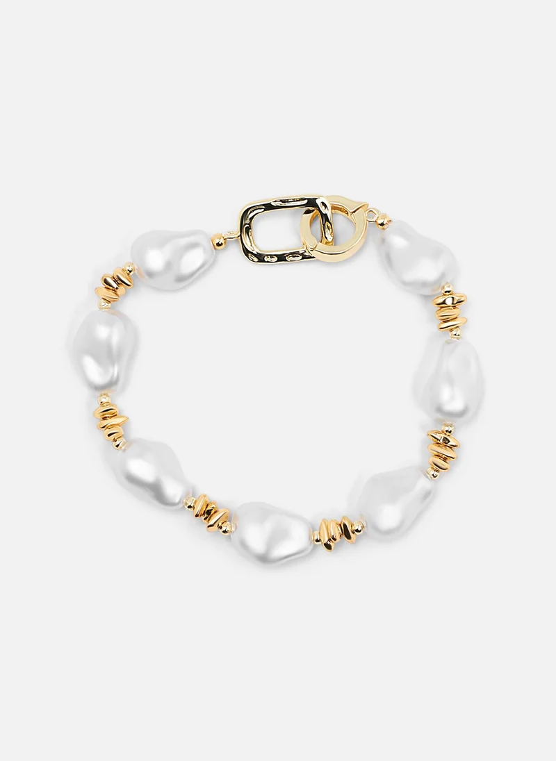 Lichi  Golden bracelet with large pearls for Women | Best Price UAE