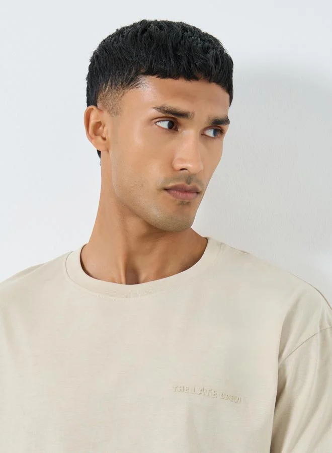 Styli Styli Men Beige Oversized Printed Jersey T-Shirt