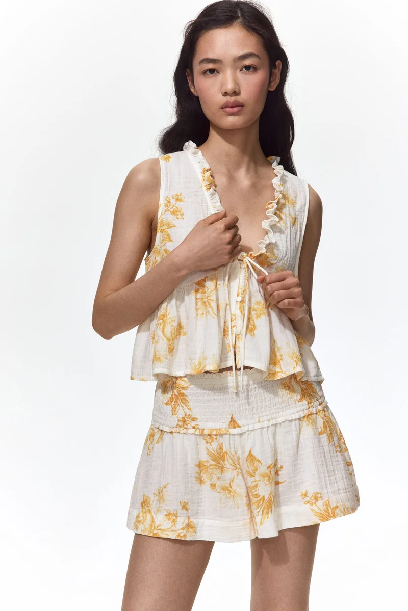 H&M Muslin peplum top