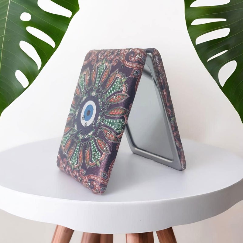 Portable Compact Evileye Metal and Glass Mirror for Women for Purses and Handbags and Travel with 2x1 Magnification one Side Colour and Print May Vary According to Availability  - Image 1