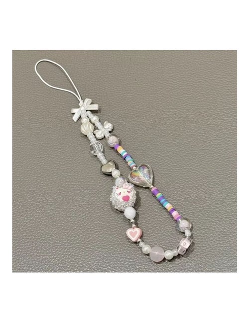 Stylishly designed necklace that attaches to the phone, with a plastic part to secure it to the phone