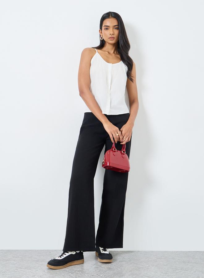 تايك تو بلوزة سادة بدون أكمام - Image 2