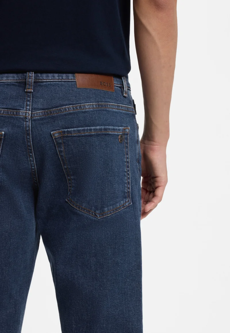 BOSS Dark Blue Maine regular-fit jeans in blue stretch denim for Men | Best Price UAE