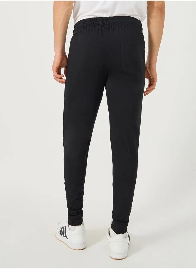 Styli Embroidered Ribbed Cuff Joggers with Drawstring