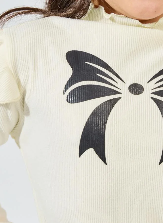 Styli Ribbed Knit Bow Printed Ruffle Trim Top
