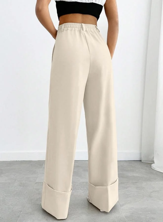 تايك تو بنطال واسع أبيض مائل