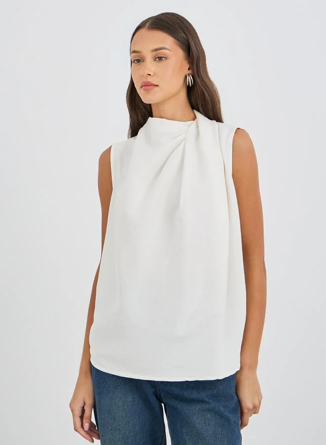Styli Solid Asymmetric Neck Sleeveless Top