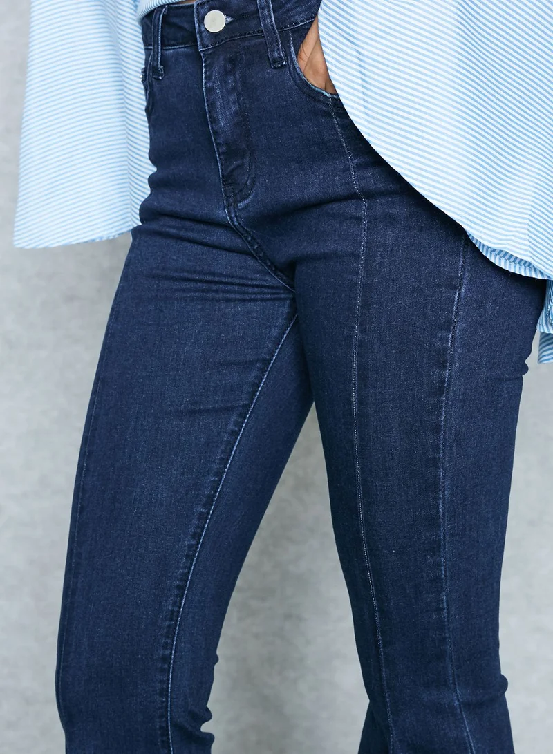 Jovonna London Flared Ripped Hem Jeans