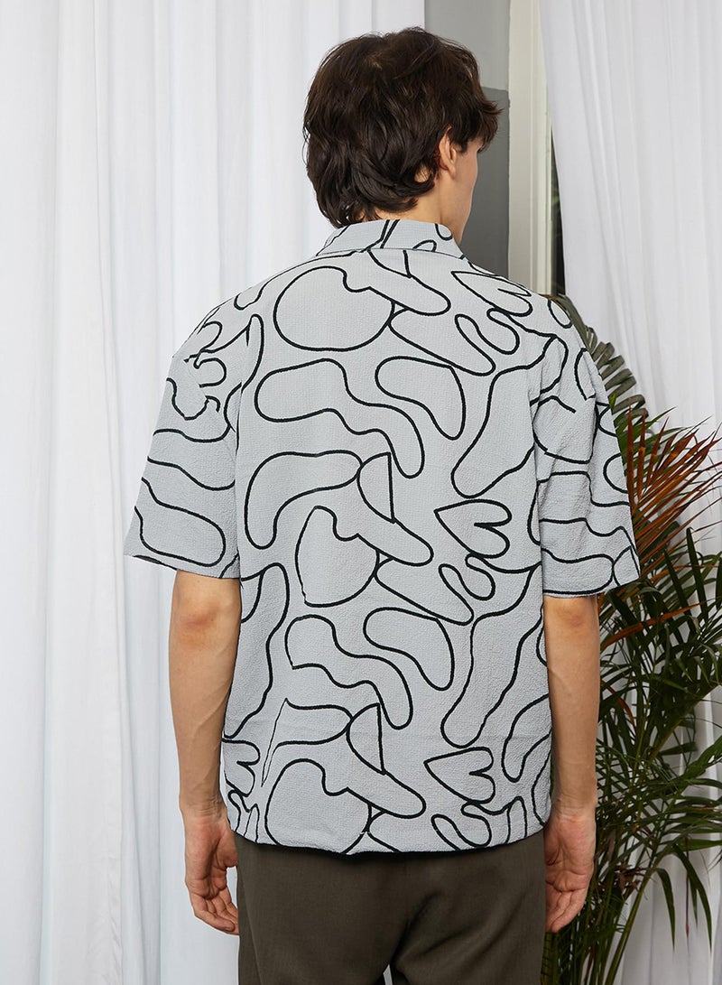 Campus Sutra Campus Sutra Men's Cloud Grey Abstract-Lined Oversized Shirt For Casual Wear | Cuban Collar | Short Sleeve | Button Closure | Oversized Shirt Crafted With Comfort Fit For Everyday Wear  - Image 5