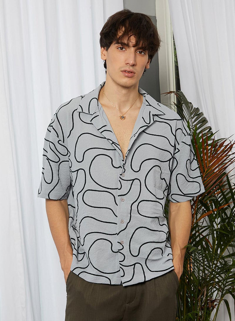 Campus Sutra Campus Sutra Men's Cloud Grey Abstract-Lined Oversized Shirt For Casual Wear | Cuban Collar | Short Sleeve | Button Closure | Oversized Shirt Crafted With Comfort Fit For Everyday Wear  - Image 2
