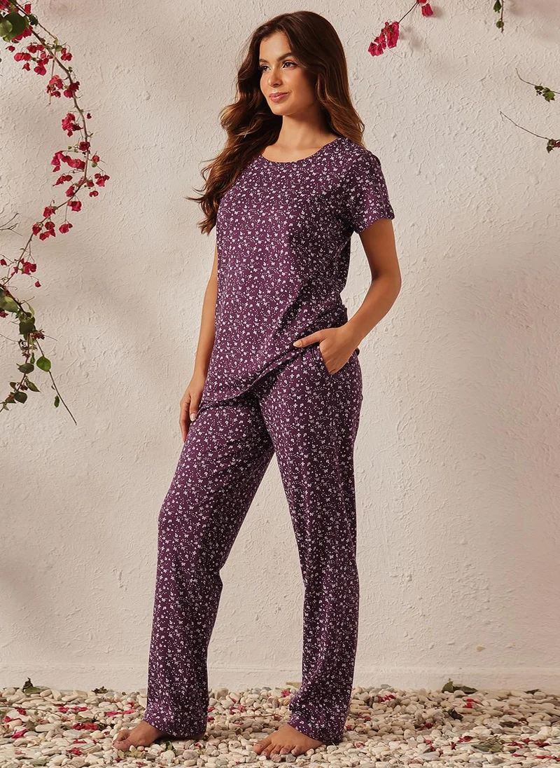 Clovia Purple Clovia Floral Print T-shirt & Pyjama Set in Dark Purple - 100% Cotton for Women | Best Price UAE