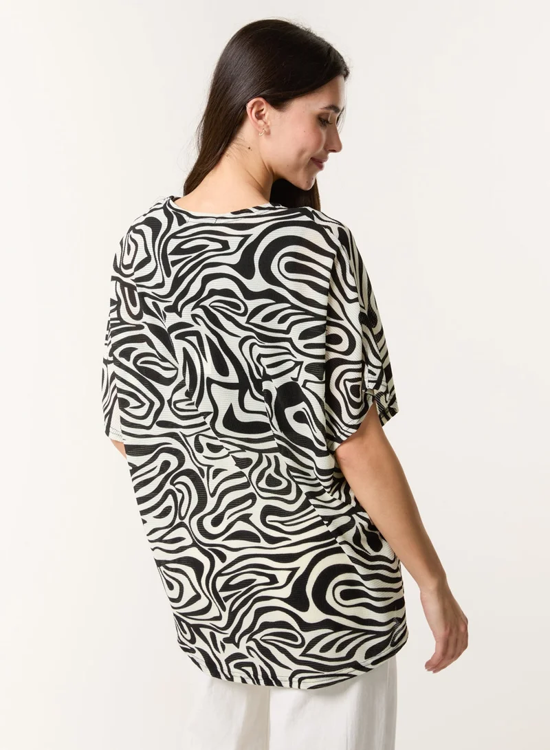 Blue Vanilla Short-Sleeved Top With Abstract Print