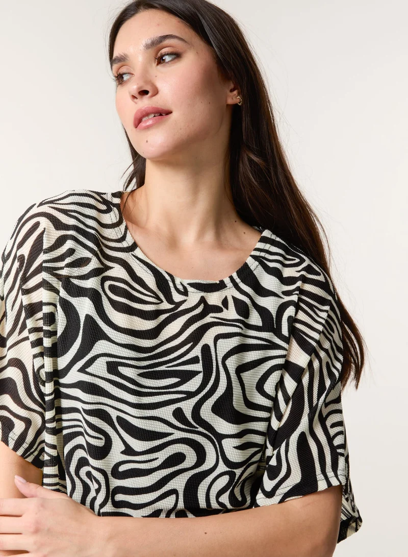 Blue Vanilla Short-Sleeved Top With Abstract Print