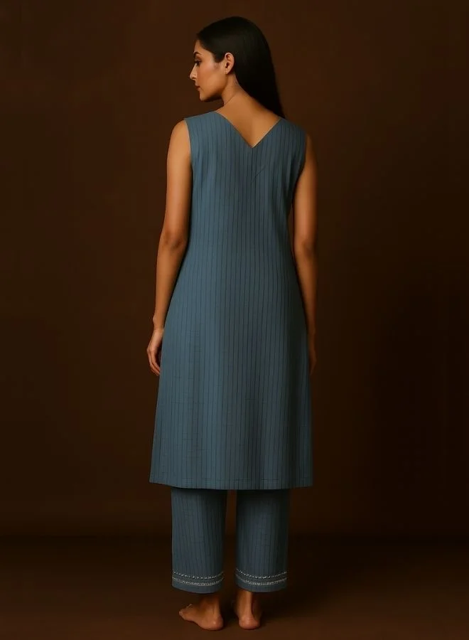 Abhishti V Neck Textured Kurta pant set with delicate lace detailings