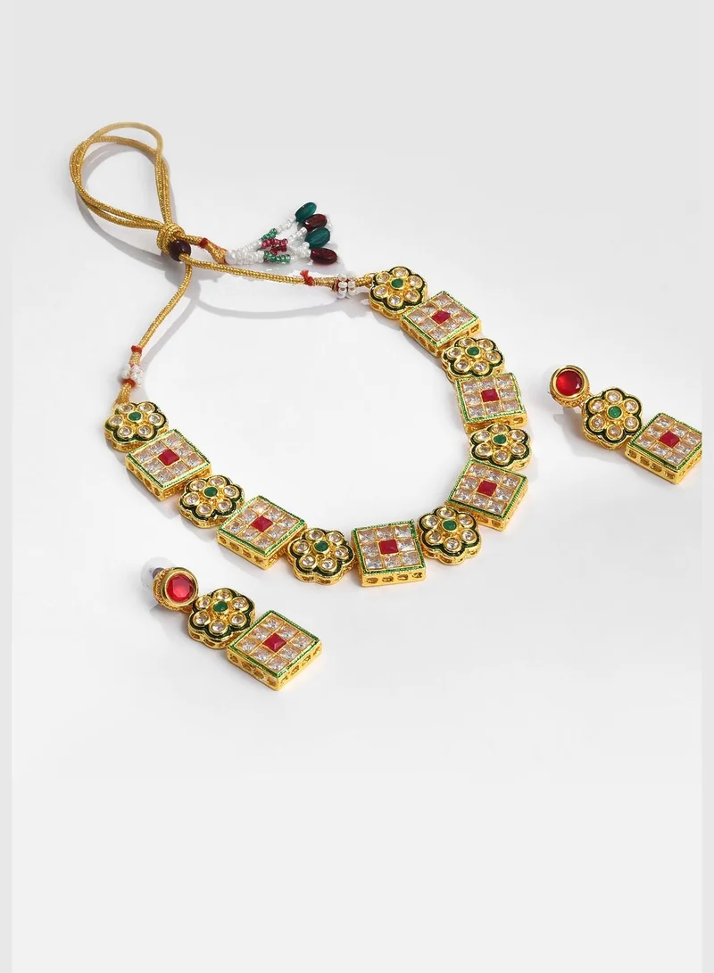 SOHI Gold Plated Designer Stone Necklace and Earrings Set