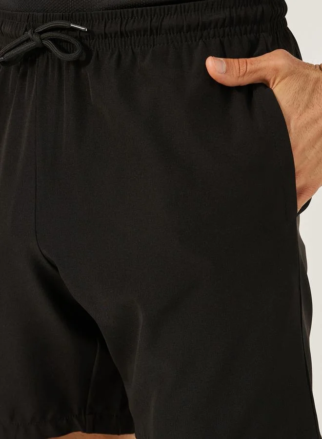 Styli Back Reflector Print Training Shorts with Pockets