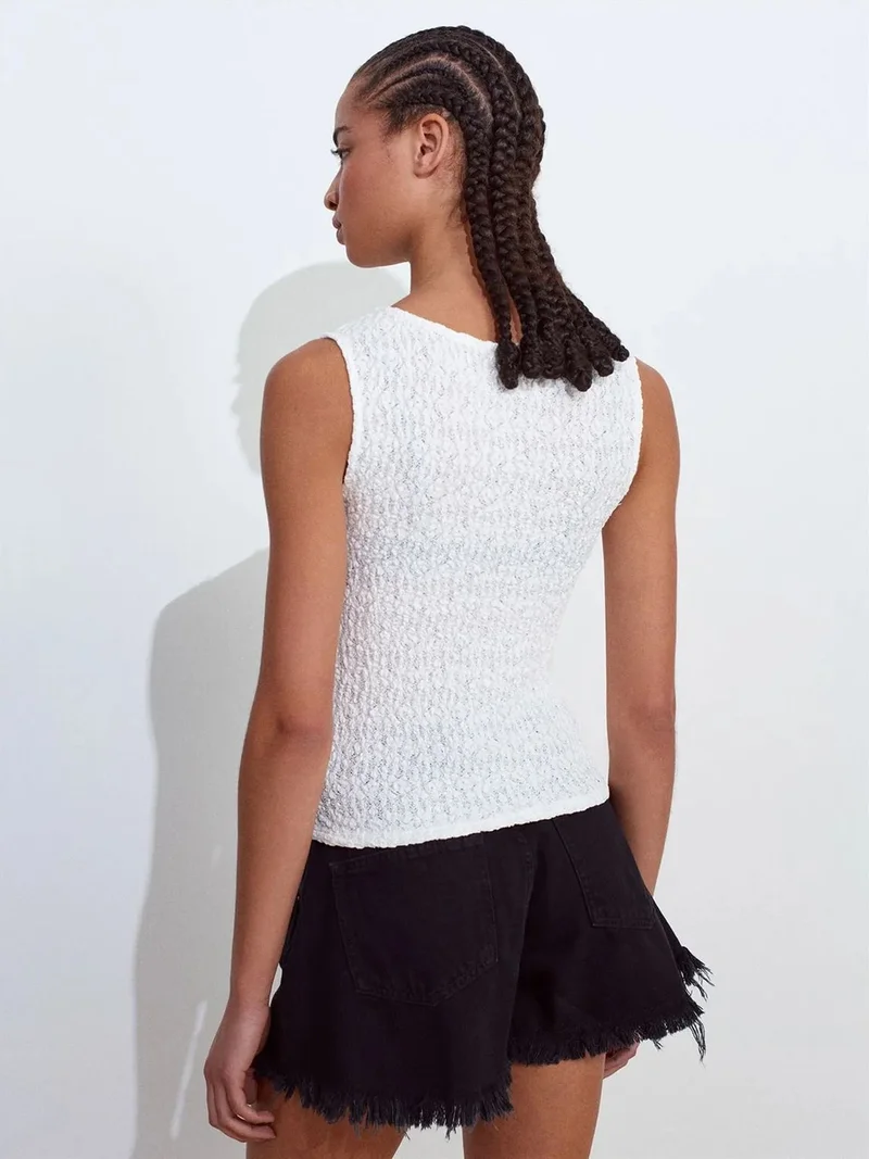 ديلفين DILVIN Fitted Sleeveless Lace-knit Blouse