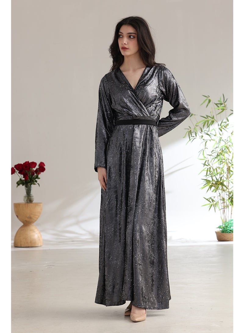 A long, shimmering evening dress with a wrap style and a waist belt. - Image 3