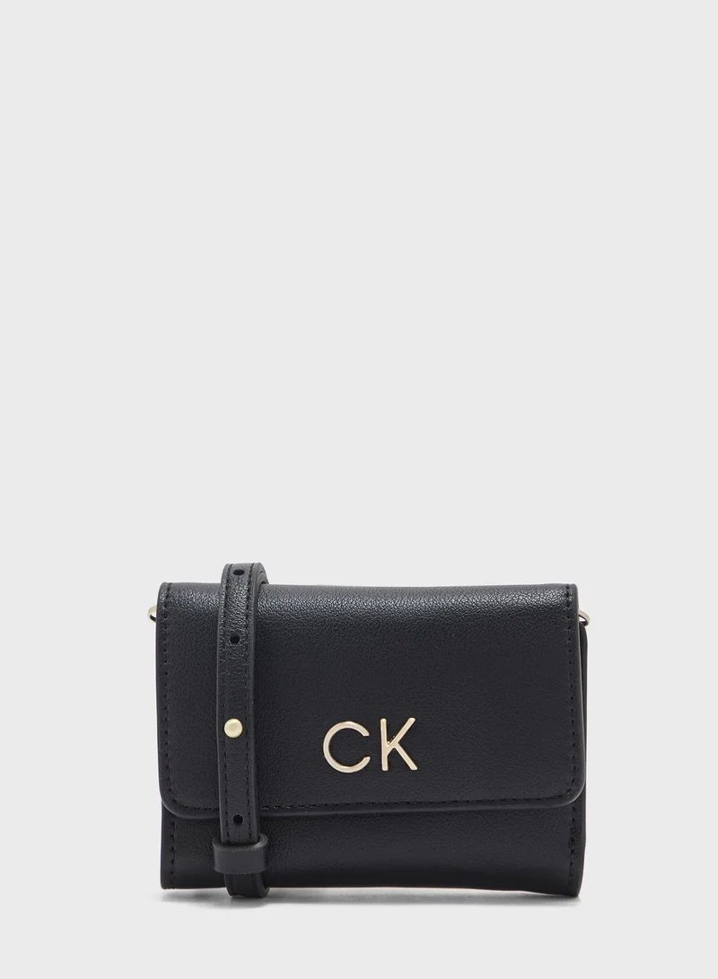 CALVIN KLEIN Reversible Lock Trifold Crossbody Bag