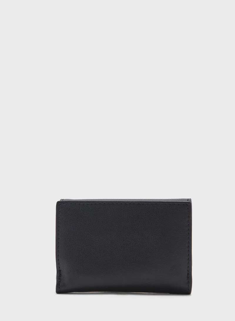 CALVIN KLEIN Reversible Lock Trifold Crossbody Bag