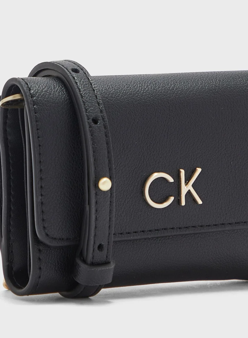 CALVIN KLEIN Reversible Lock Trifold Crossbody Bag
