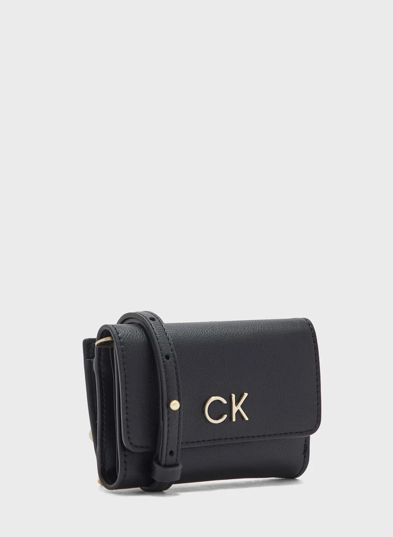 CALVIN KLEIN Reversible Lock Trifold Crossbody Bag
