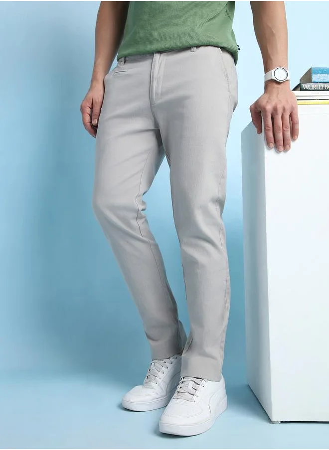 Dennis Lingo Sophisticated Light Grey Straight Fit Chinos for Men featuring coin pocket detailing, made from a breathable and stretchable fabric for a stylish look.