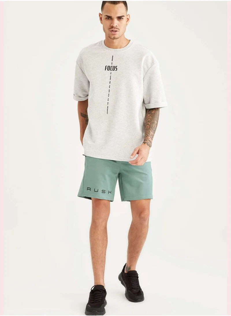 DeFacto Slim Fit Text Print Sports Short