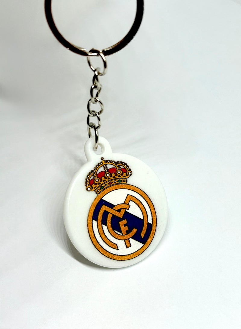 ميدالية مفاتيح لنادي ريال مدريد ، ميدالية للأولاد لنادي ريال مدريد ، ميدالية لشعار ريال مدريد ، ميدالية للمفاتيح للكبار و الصغار ، تعليقة مفاتيح، تعليقة محفظة و شنطة ، مداليه تعليقه تتناسب مع السيارة والمحفظة والحقيبة , سلسلة مفاتيح لشعار نادي ريال مدريد تناسب ان تكون هدية رائعة  . - Image 1