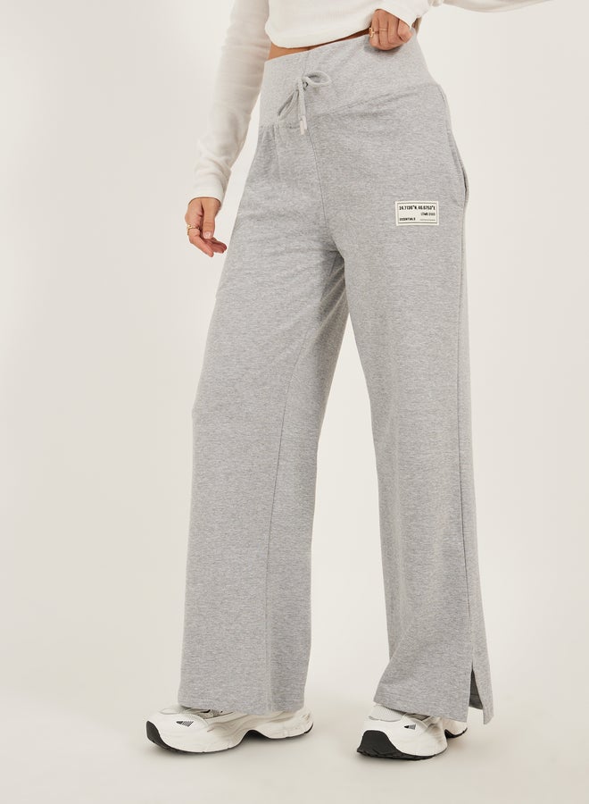 Styli Styli Badge Detail Wide Leg Joggers with Side Slit - Image 2