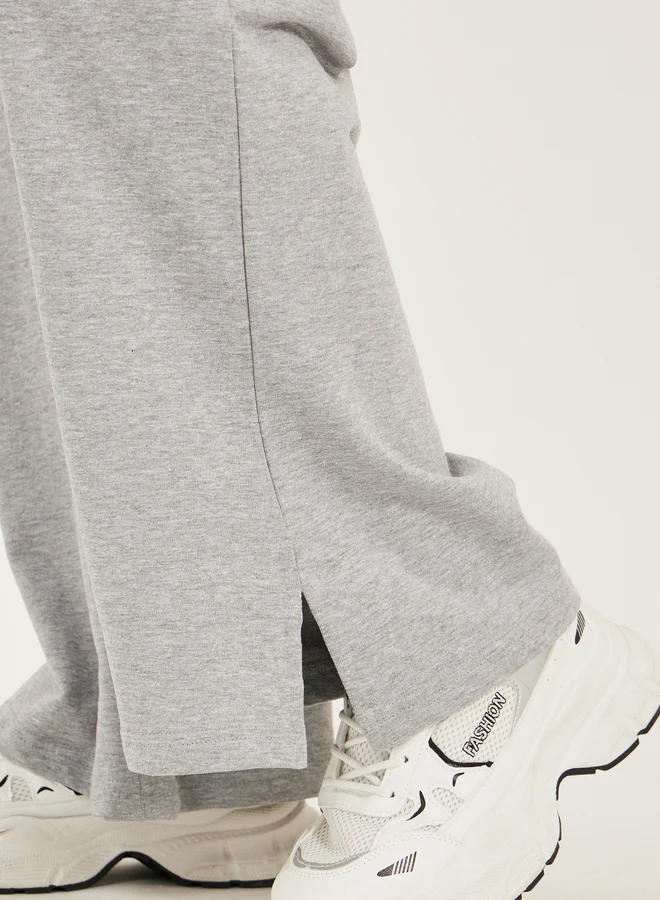 Styli Badge Detail Wide Leg Joggers with Side Slit