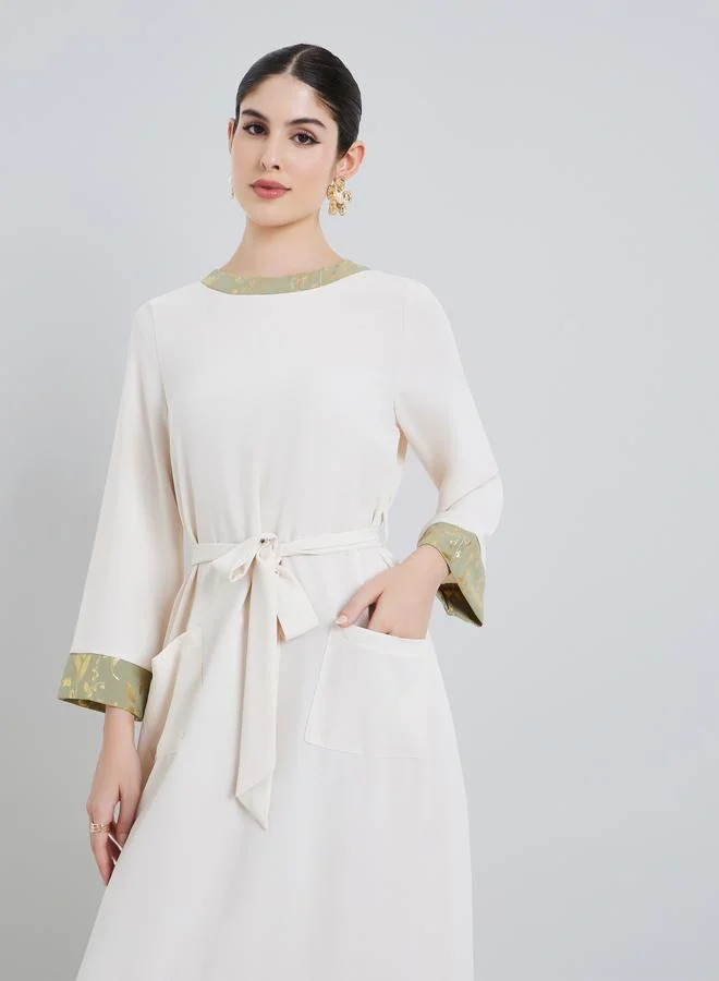 أميرة جلابية نسائية بتصميم - وطبعة لامعة باللون الكريمي