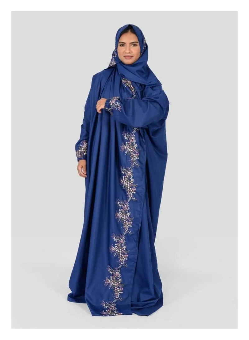 Navy blue prayer gown with elegant patterns.