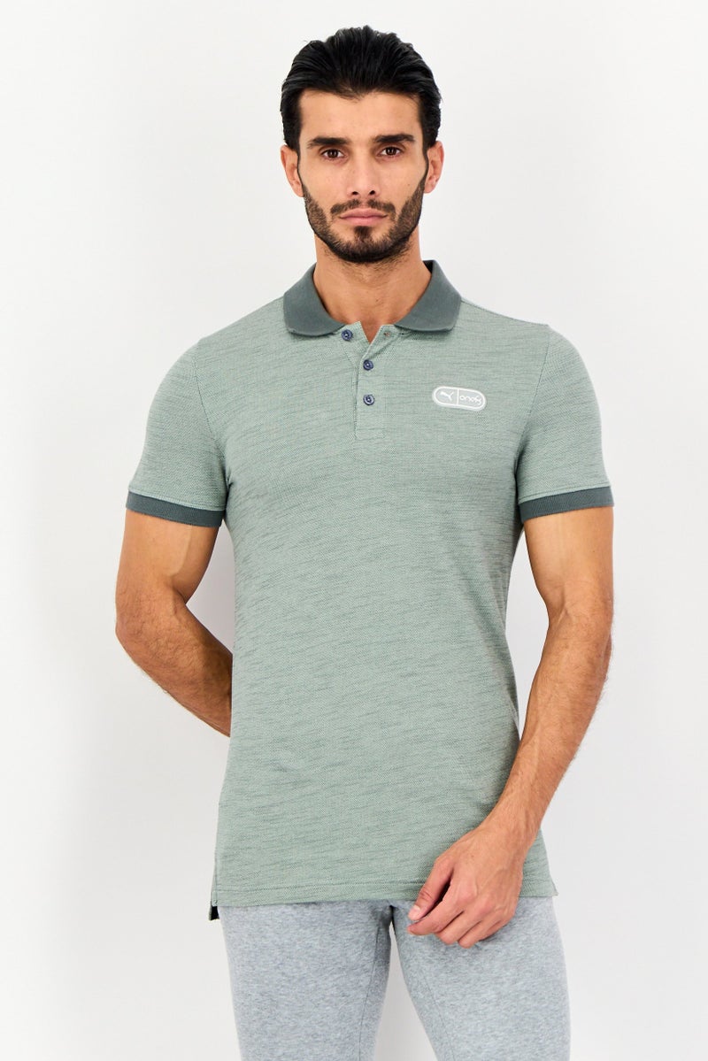 PUMA قميص بولو خارجي بأكمام قصيرة بتصميم نحيف للرجال من بومة x One8، أخضر بالسام - Image 1