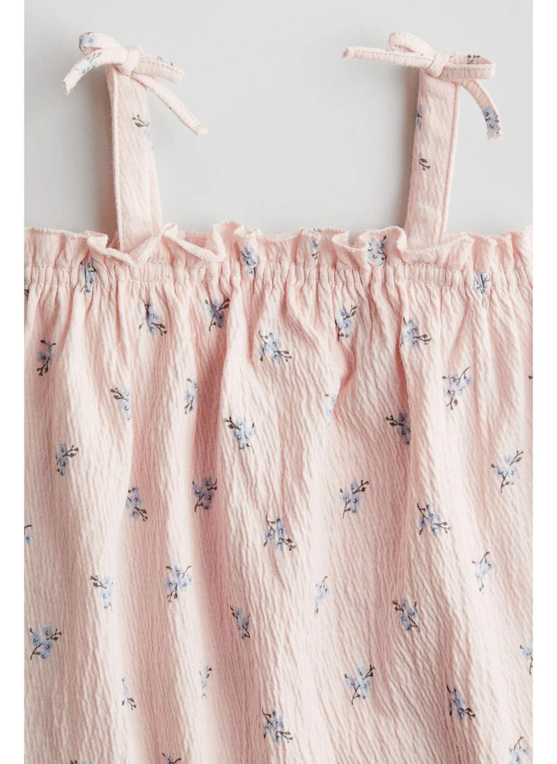 H&M Crinkled romper suit