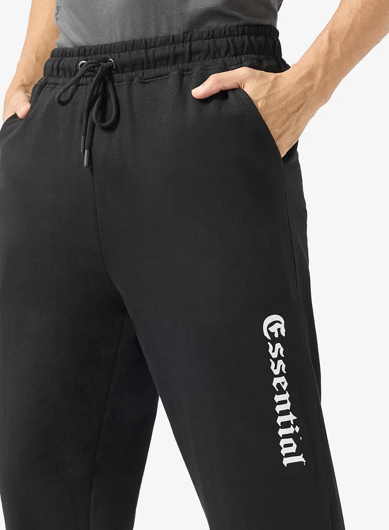 Seventy Five Black Text Print Oversized Joggers for Men | Best Price UAE